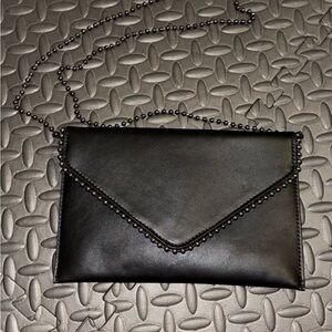 Sleek Black Chain-Embellished Clutch